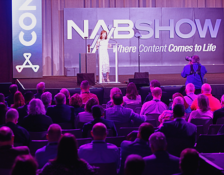 Presenter on stage at NAB Show